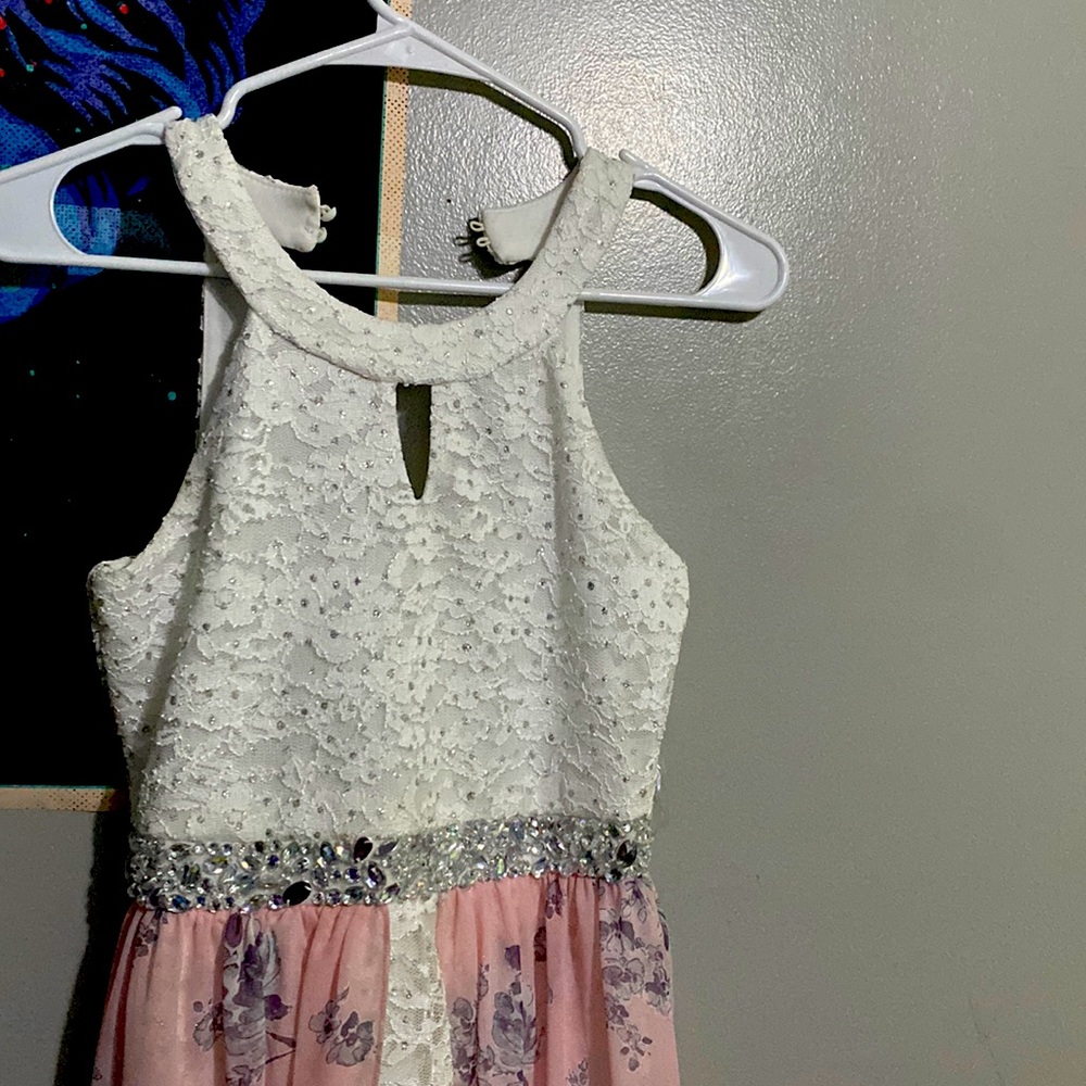 Dress/jumpsuite with attached skirt